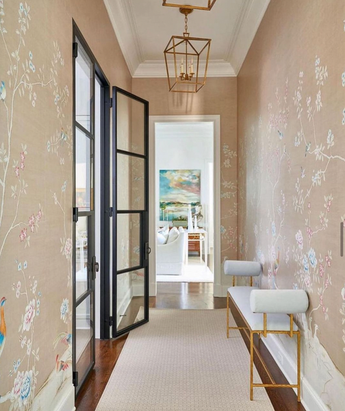 pale pink chinoiserie wallpaper in entry way