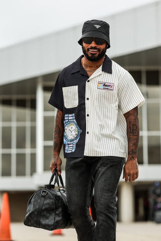 Cornerback of the Green Bay Packers, Keisean Nixon seen wearing the Homme Femme Presidential Striped Doodle Shirt in black & white. Oversized fit with elegant accents to finish the garment including our multi-color silicone patch at wearer's left chest, sublimated graphic at wearer's right bodice, and buttons at center front closure. (via Green Bay Packers Instagram Story, @packers and via Keisean Nixon Instagram Post, @keiseannixon)