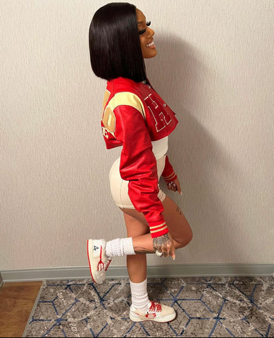 Rapper of CMG The Label, GloRilla seen in a customized Homme Femme “Bel-Air Varsity Jacket” Red.