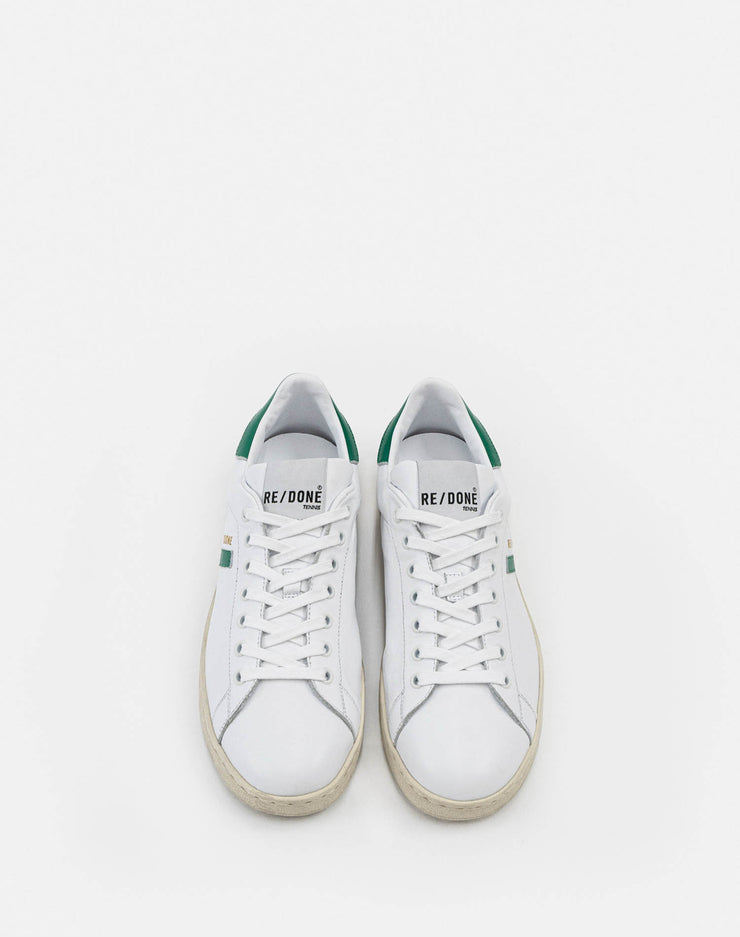 green and white tennis shoes