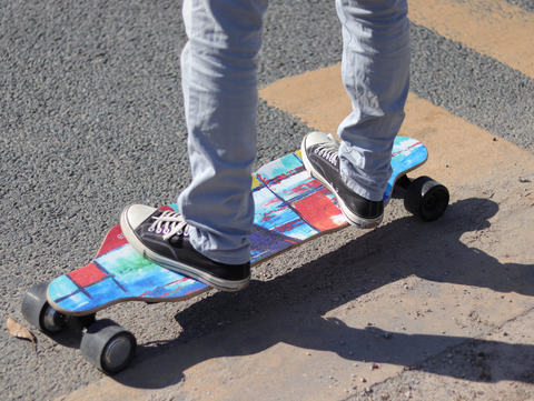 riding electric skateboard