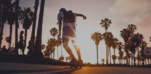 electric skateboard sunset