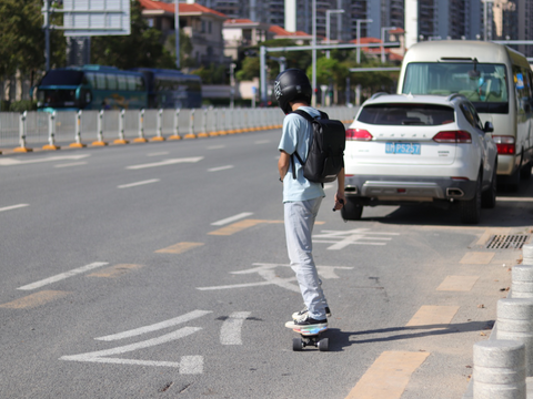 electric skateboard with safety gear