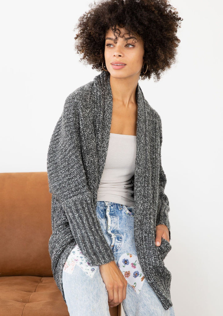 [Color: Charcoal] An open knit marled cardigan. Featuring a flattering cocoon fit, a relaxed shawl collar, and essential side pockets.