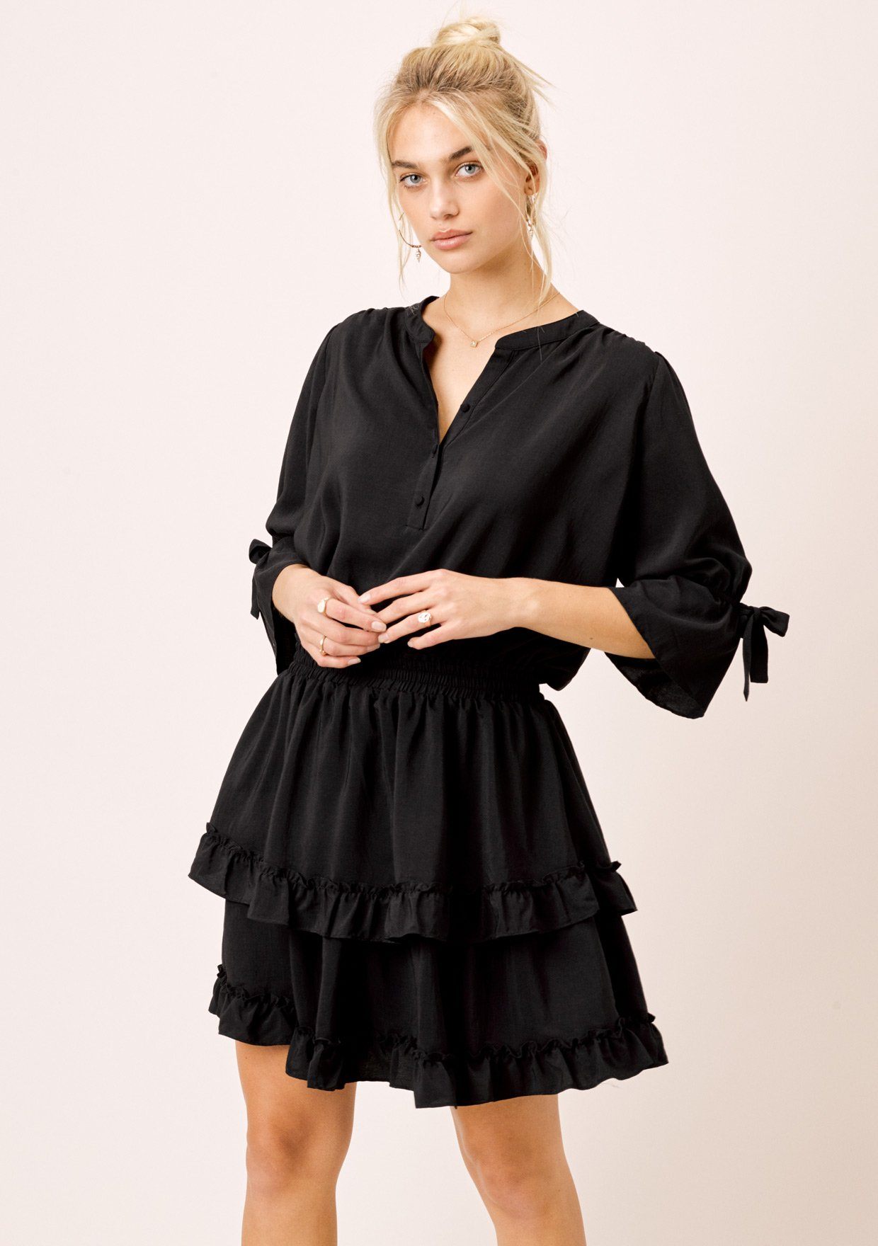 black tiered mini dress