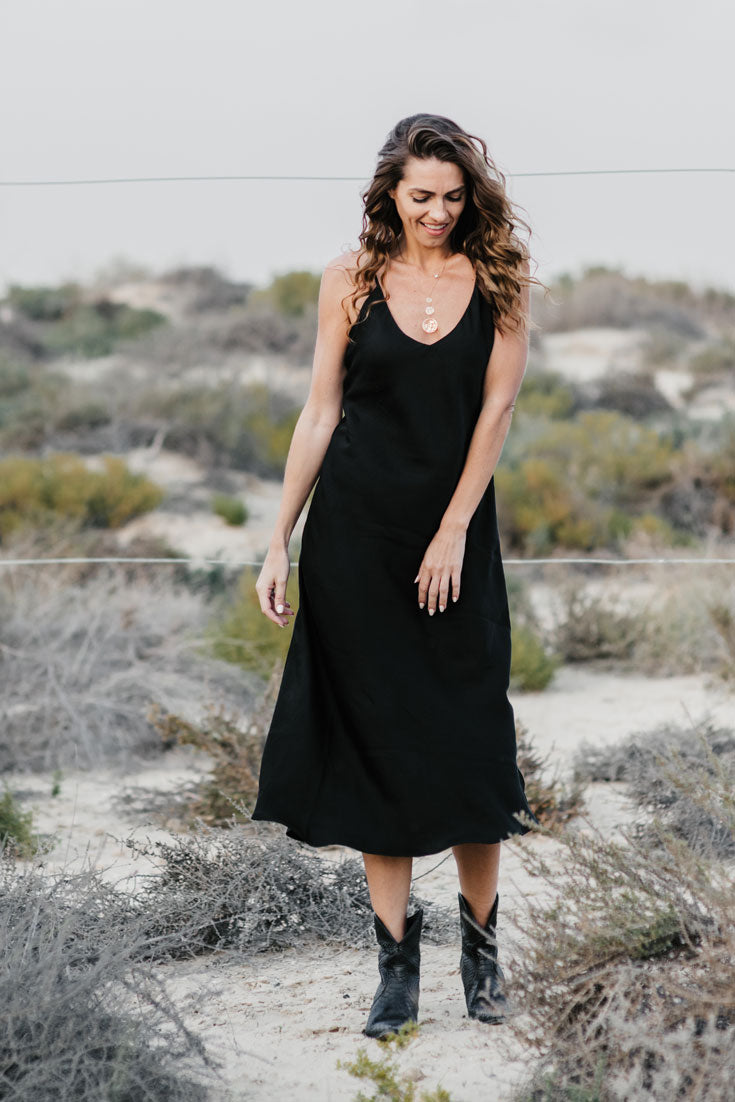 The Kathy Dress is our version of the classic black slip dress. We think every woman needs this versatile wardrobe essential. Made of super-soft Tencel, with a v-neck and mid-calf length.