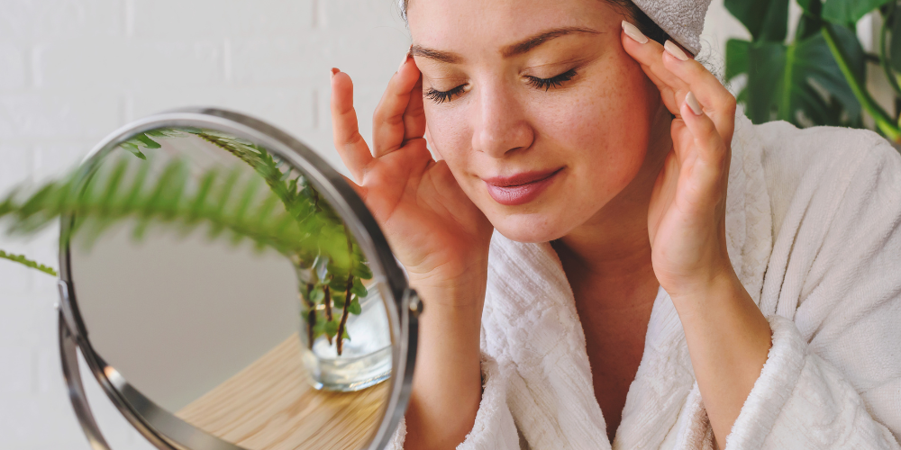 Woman cleaning face