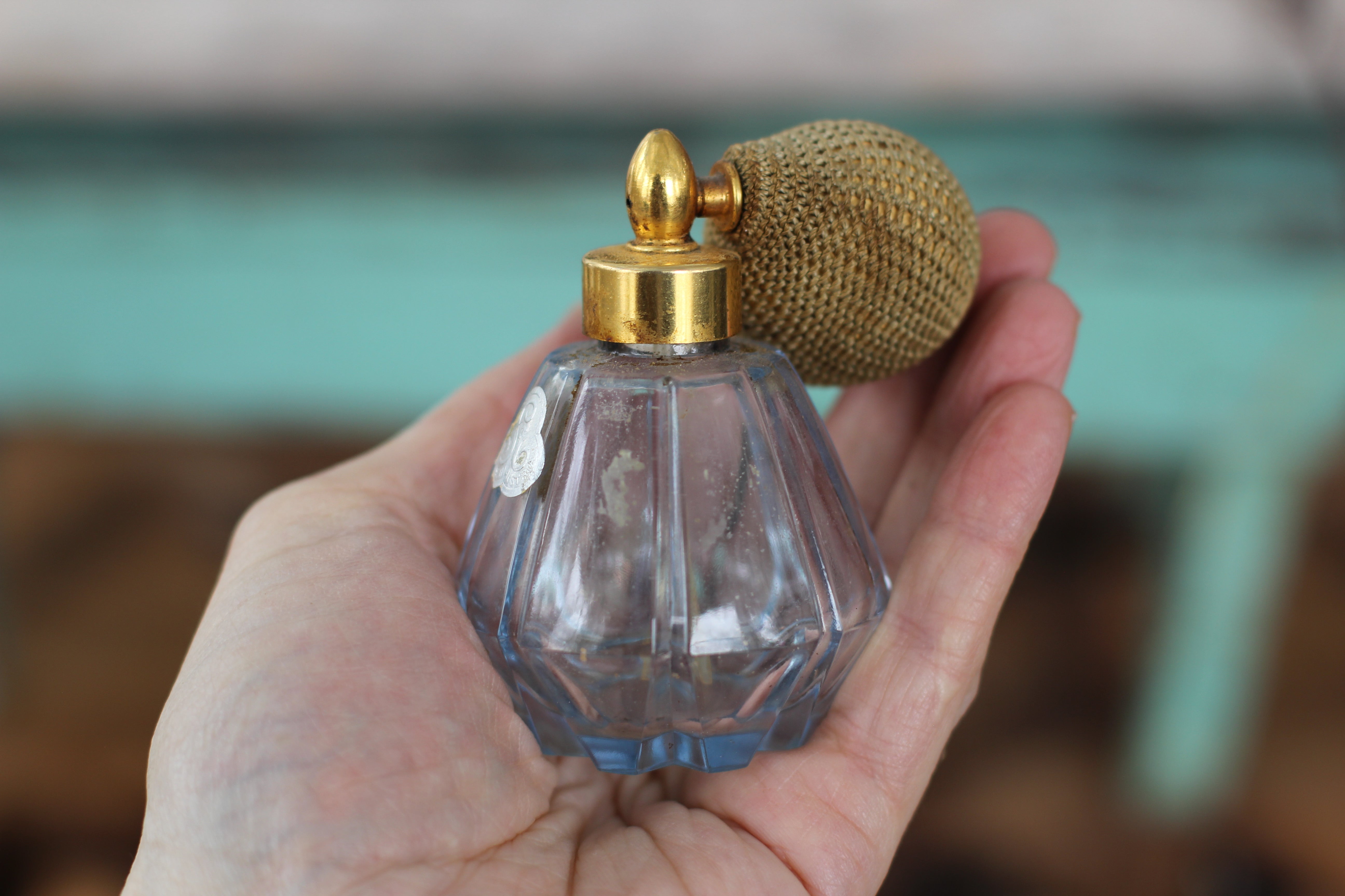 light blue perfume bottle