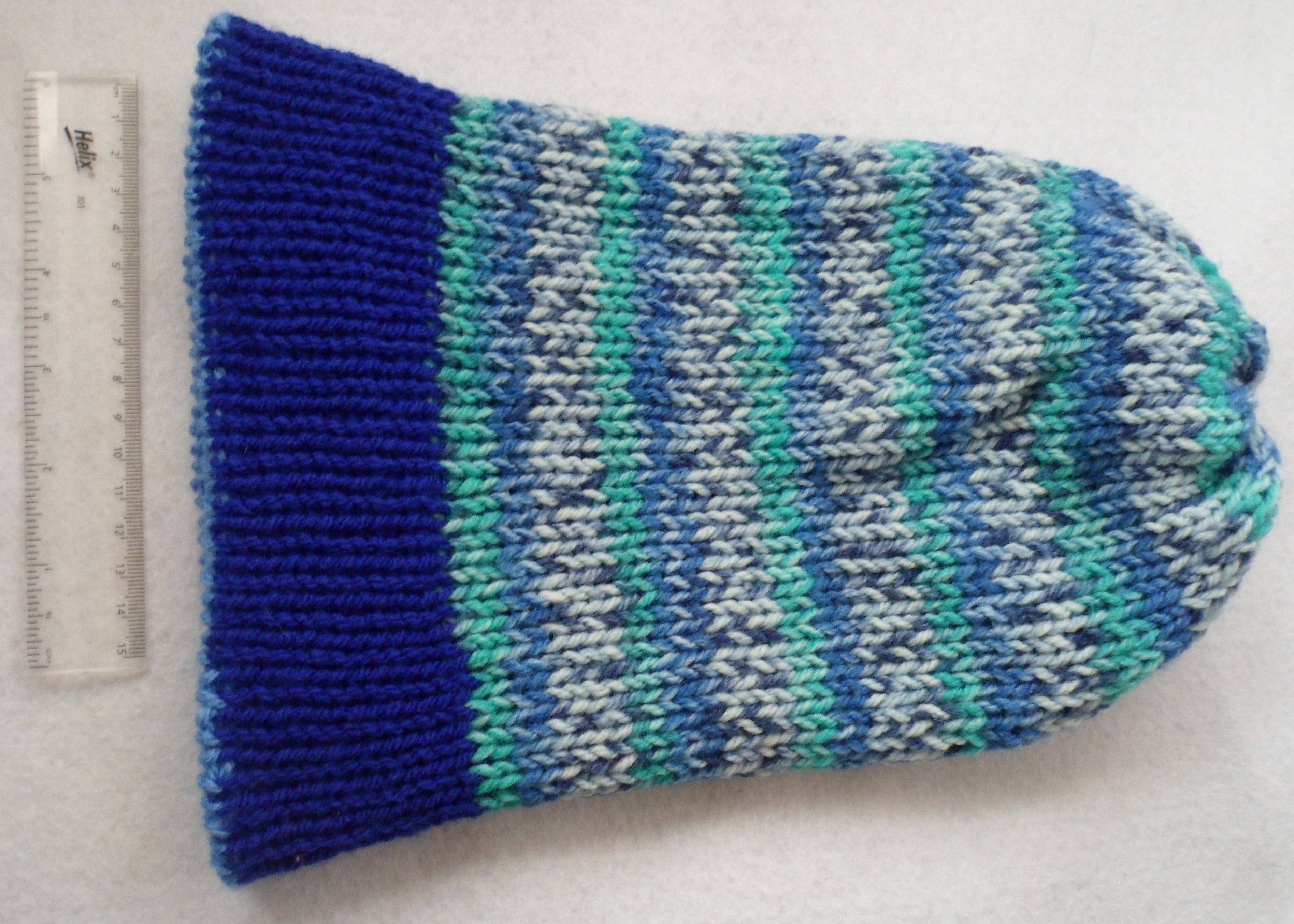 Knitted Gay Male Flag/Blue Variegated Reversible Hat - Tully Crafts