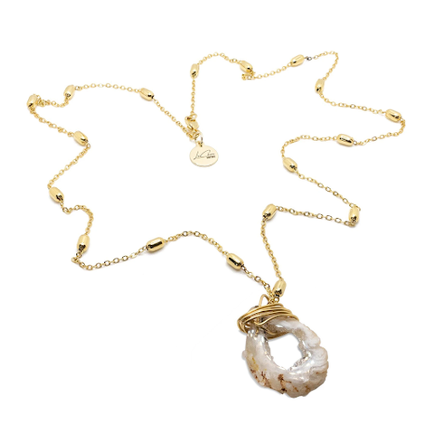 The gold Crystal Goddess Necklace designed and handcrafted by the artisans at LaCkore Couture.