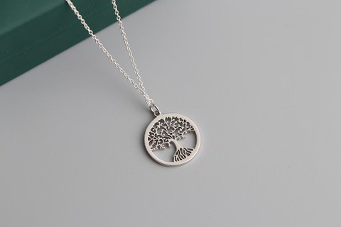 Tree-shaped charm necklace.