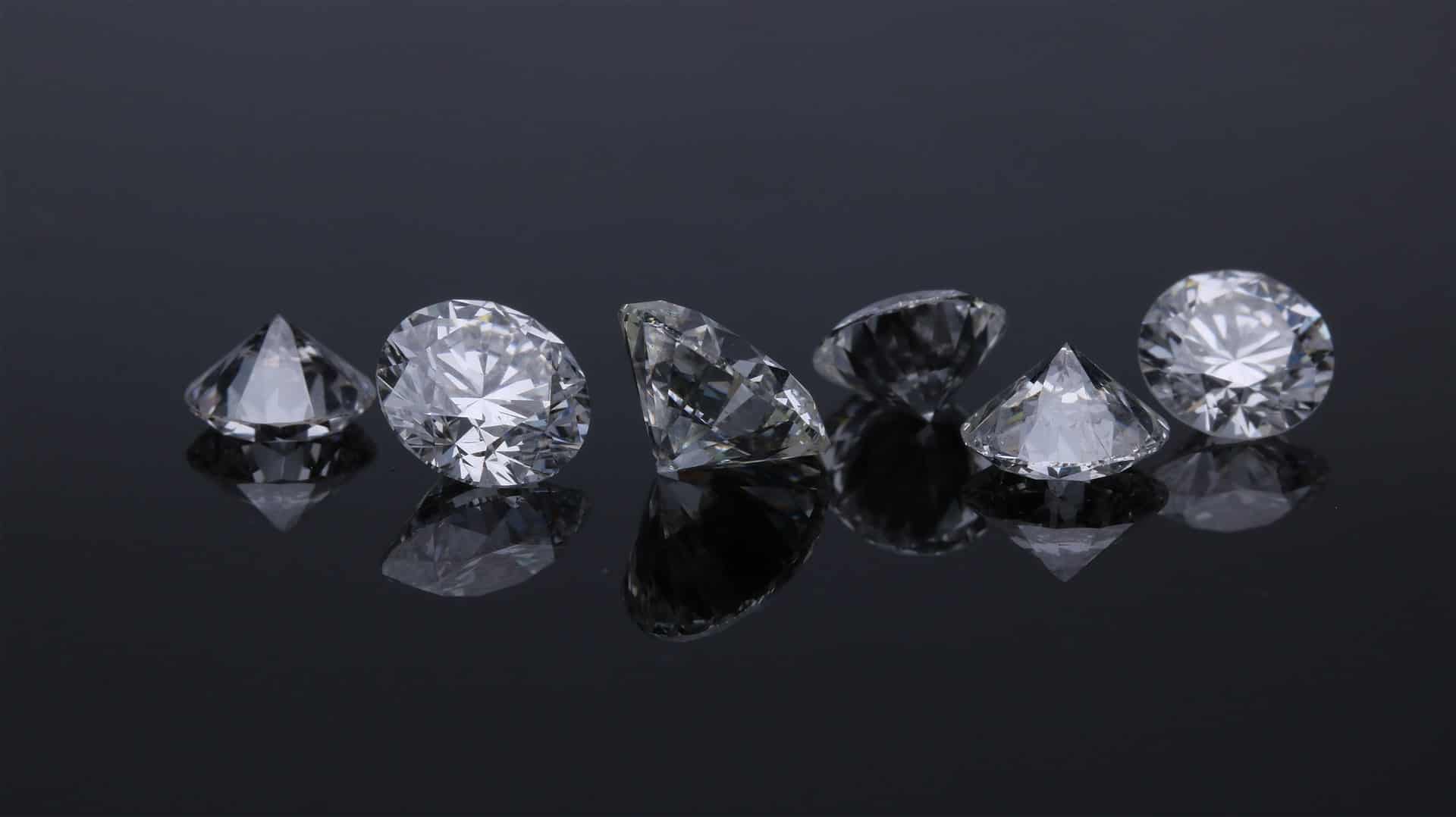 a variety of diamonds on a table