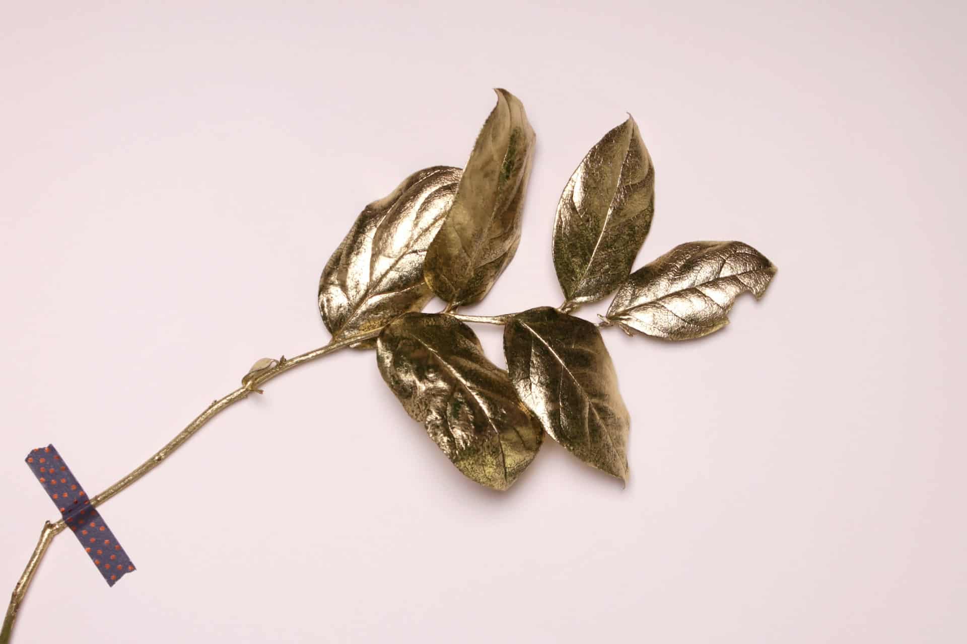 a gold plated leaf