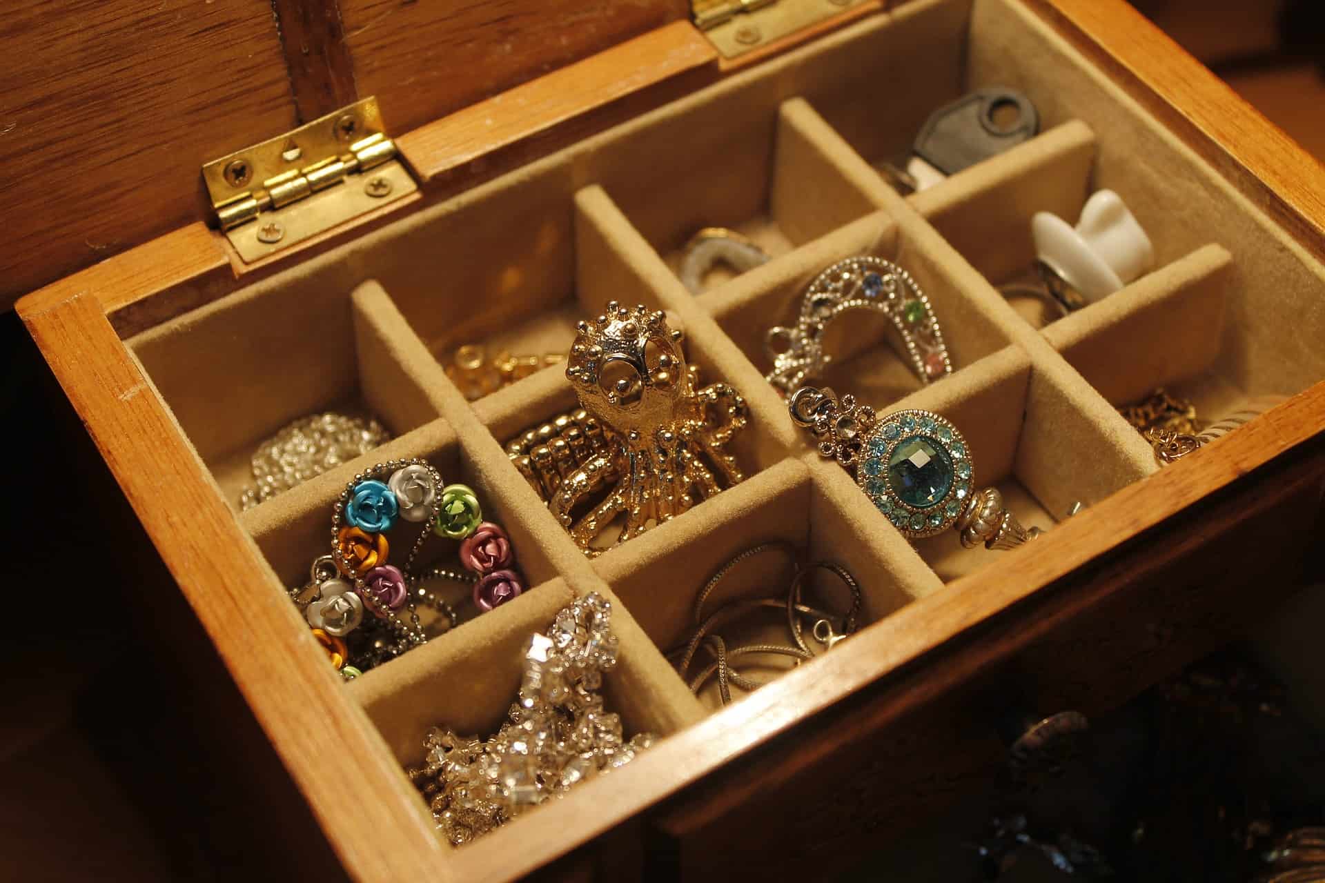 a jewelry box with various gold alternative jewelry