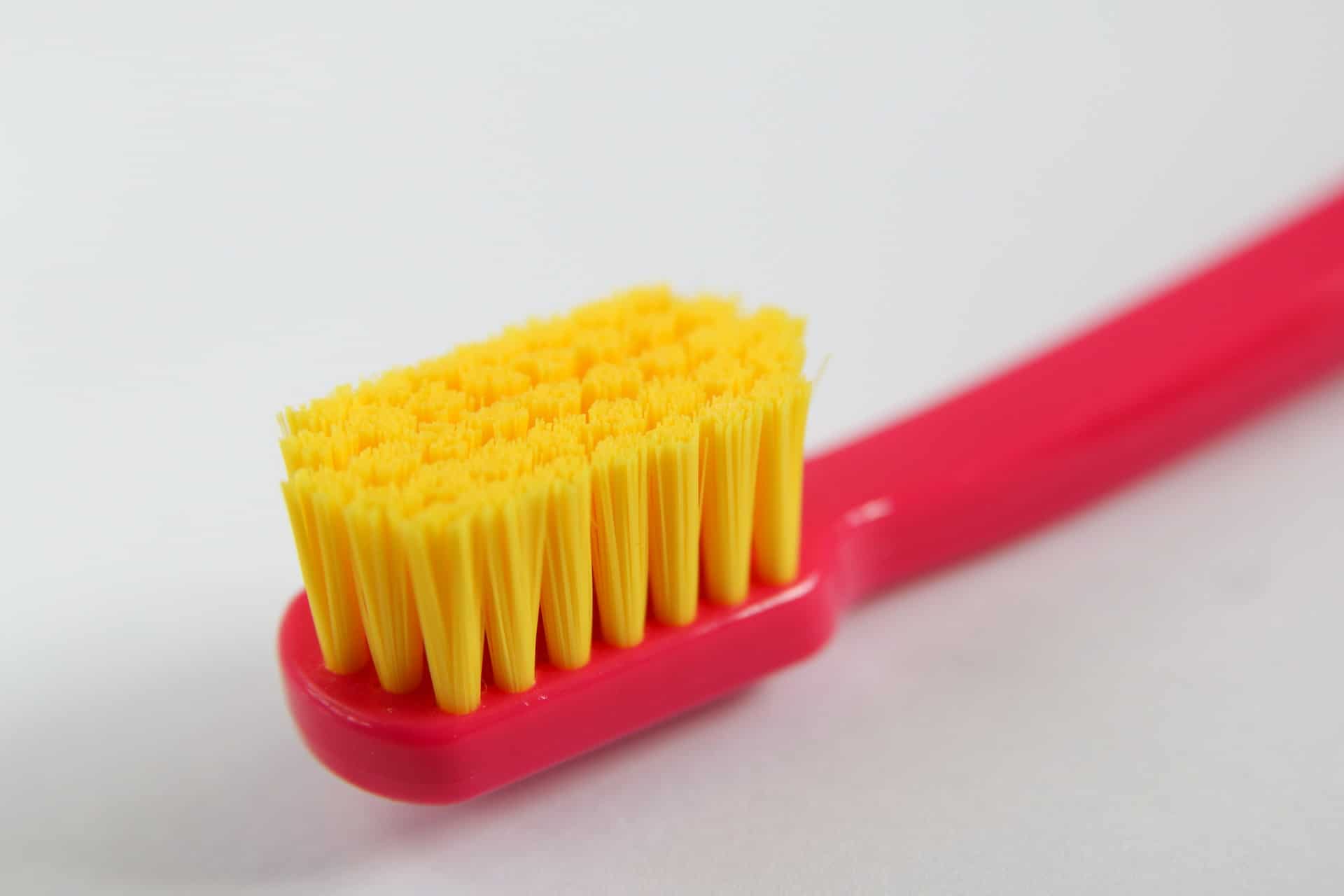 a soft-bristled toothbrush