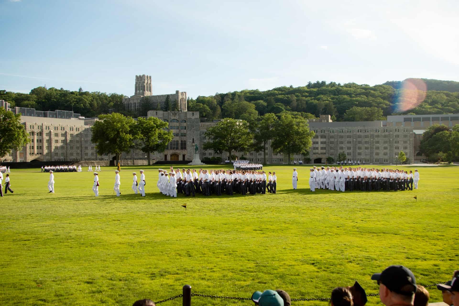 students gathered on a field at West Point