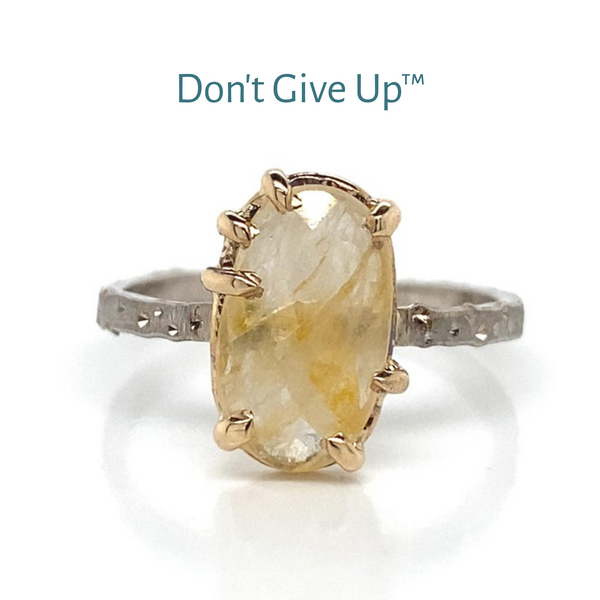 Don't Give Up™ Ring // Handmade 14k White and Yellow Ring Featuring a 3.8ct Yellow Sapphire in the Center.