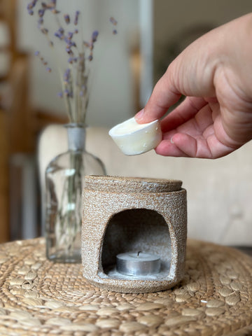 Place a new soy wax melt in your burner and enjoy.