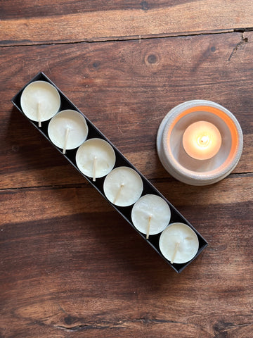 A box of 6 tealights in a Christmas scent