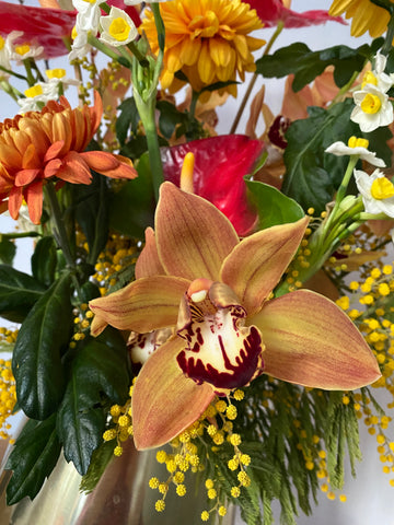 Close up of orchid in Beckenham florist Hannah Jordan Flowers' arrangement for Chinese New Year
