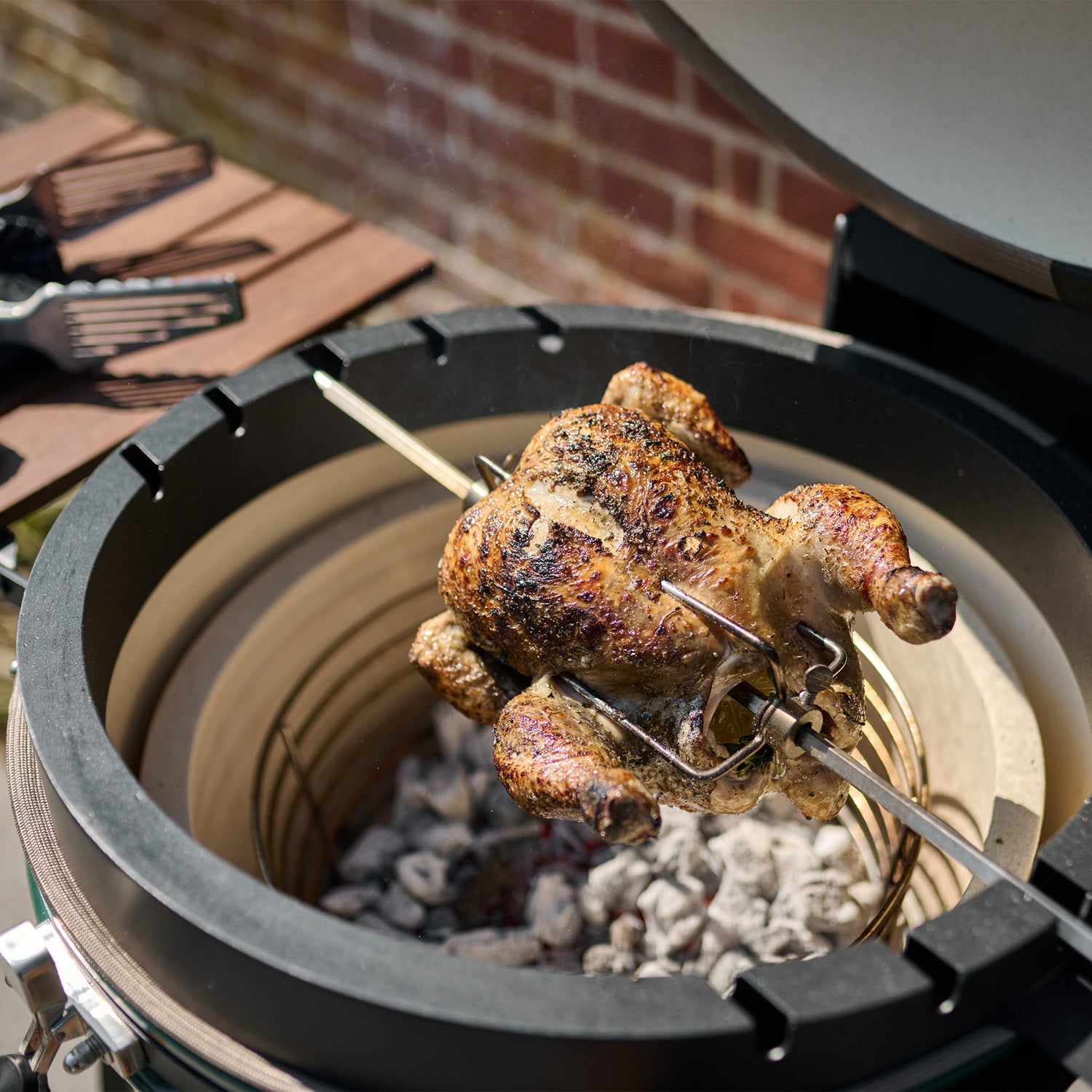 Kamado Grill Recipe for a Summer Evening: Truffle Herb Rotisserie Chicken