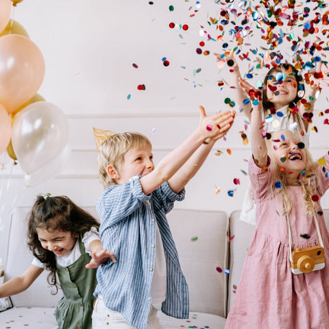 Kids Birthday Party with Confetti in the Air