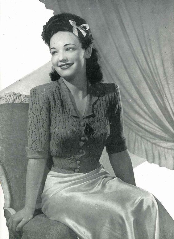 Women in 1930's wearing knit top.