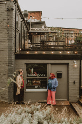 Paul and Lucy standing outside the Cookhouse.