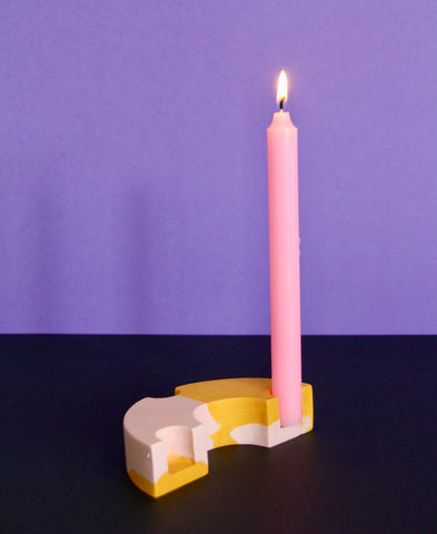 Pink and yellow marbled curved candle holder by Rekha Maker at Civil Dawn Studio