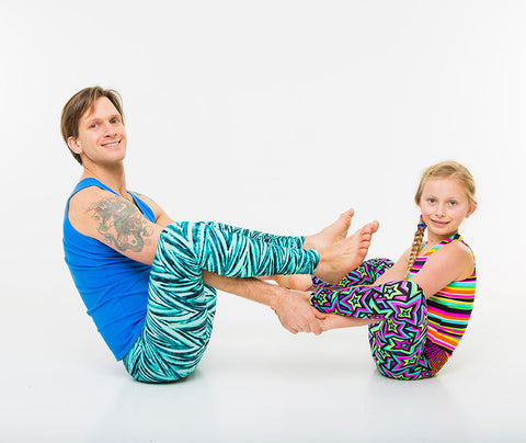 Changing The World with Family Yoga | Om Yoga Magazine