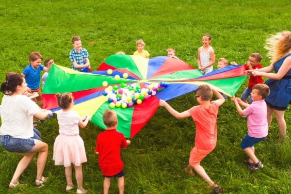 kids yoga play outside - rainbow yoga training