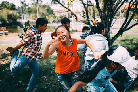 Playing Children Tag Chase - Extraordinary Things You Can Do to Save Endangered Species - Rainbow Yoga Training