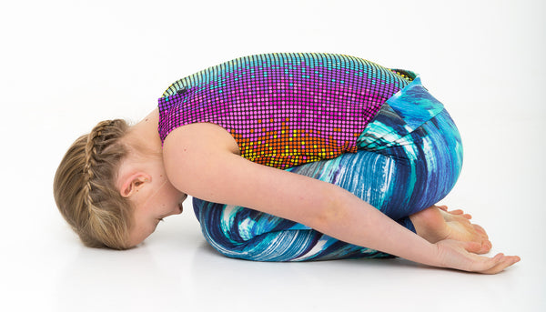 child's pose yoga sculpture - rainbow yoga training