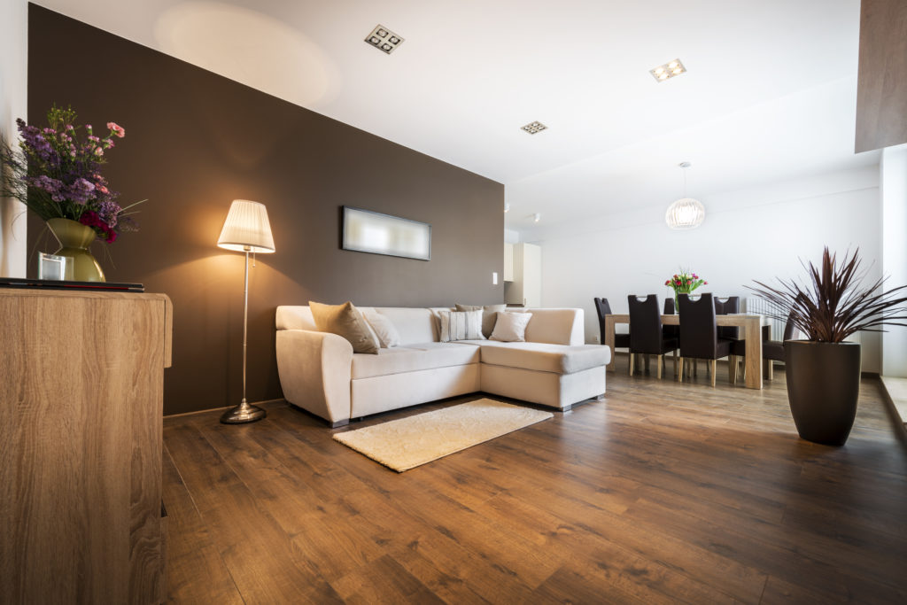 Brown laminate floor for high-traffic area in living room