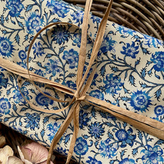 Dutch Heritage Gujarat China Blue premium quality cotton fabric with blue floral pattern on a cream background, tied with a raffia string