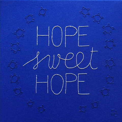 Textile embroidery art titled Hope Sweet Hope by Carolina Reis