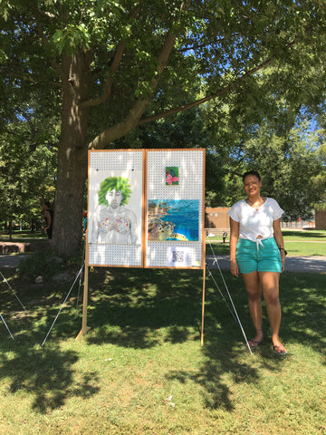 Visual artist Kaylee Meyer showint her work in the park.