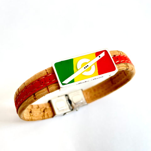 Stoke Saver in Rastafarian Flag colors of green, yellow, red with a red cork cordage strap