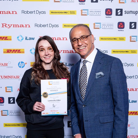 Luminosity Glitter Founder Daisy with Theo Paphitis getting her certificate