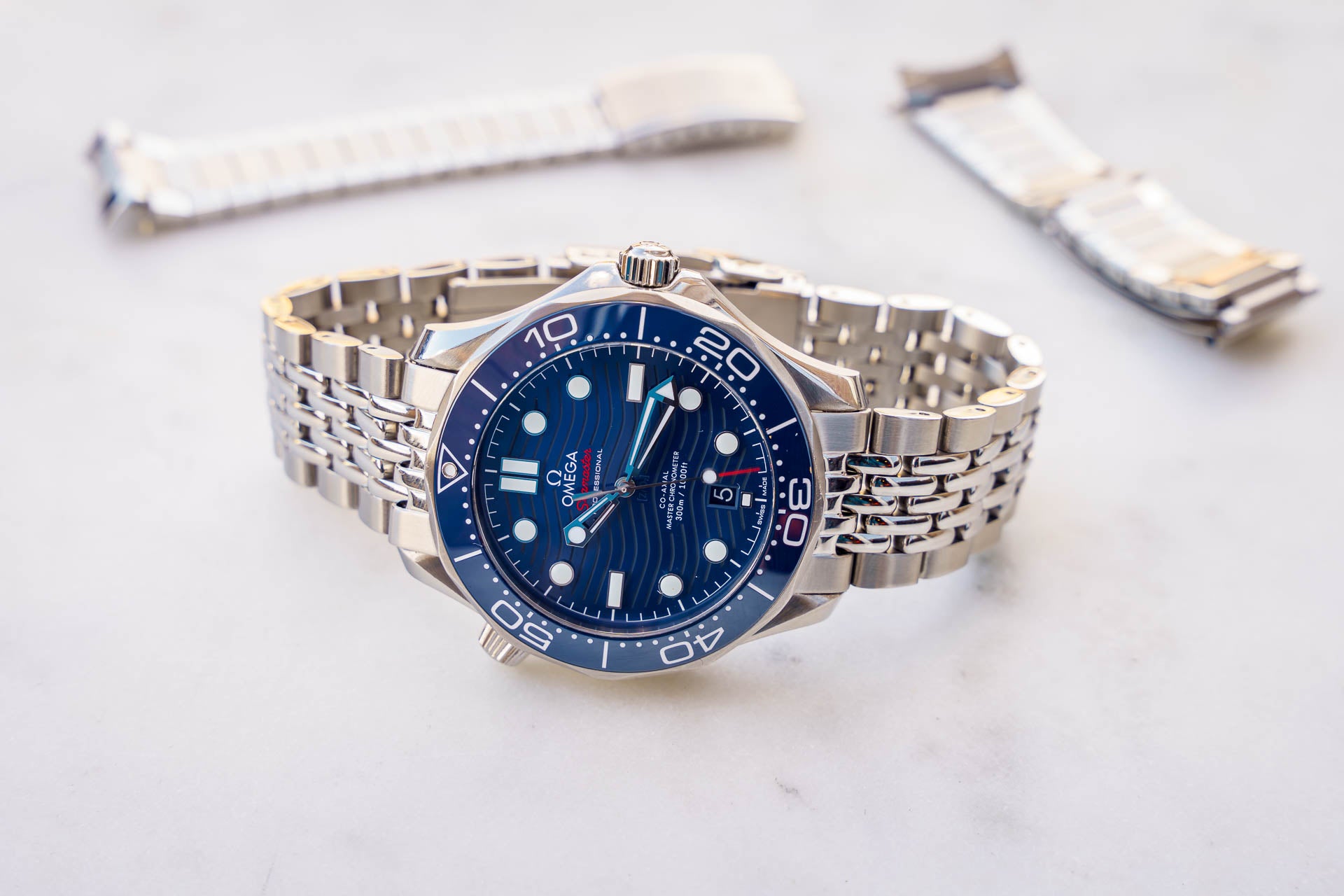 Thoughts on Sedna goldblue Seamaster on bracelet Considering selling my  black dial and buying one of these  rOmegaWatches