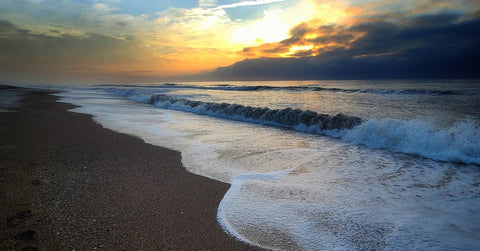 Amelia Island beach shore at sunset 