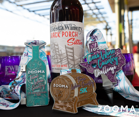 wine bottle and race medals 