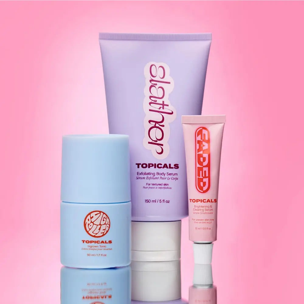 Acne skincare essentials from Topicals including High Roller, Slather, and Faded serums on pink backdrop.