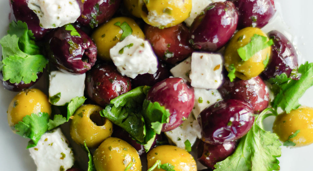 Colorful olive and cheese salad 