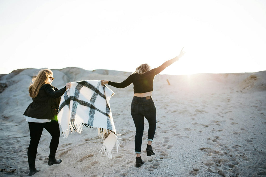 two women dancing on a path