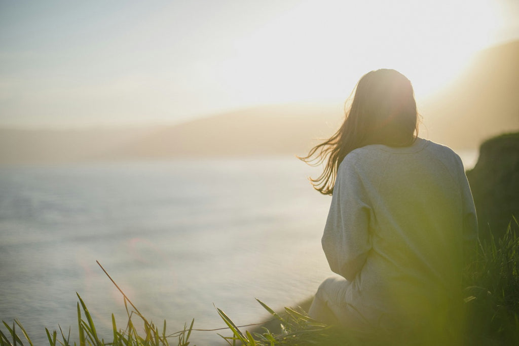 woman admiring the landscape and the sea