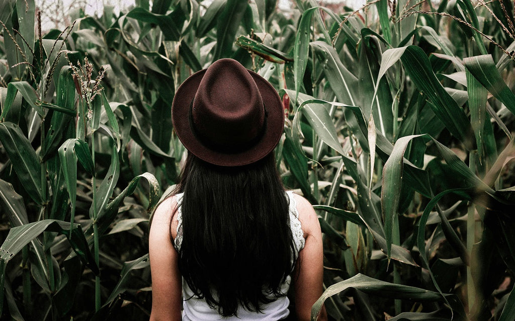 woman from behind in the forest