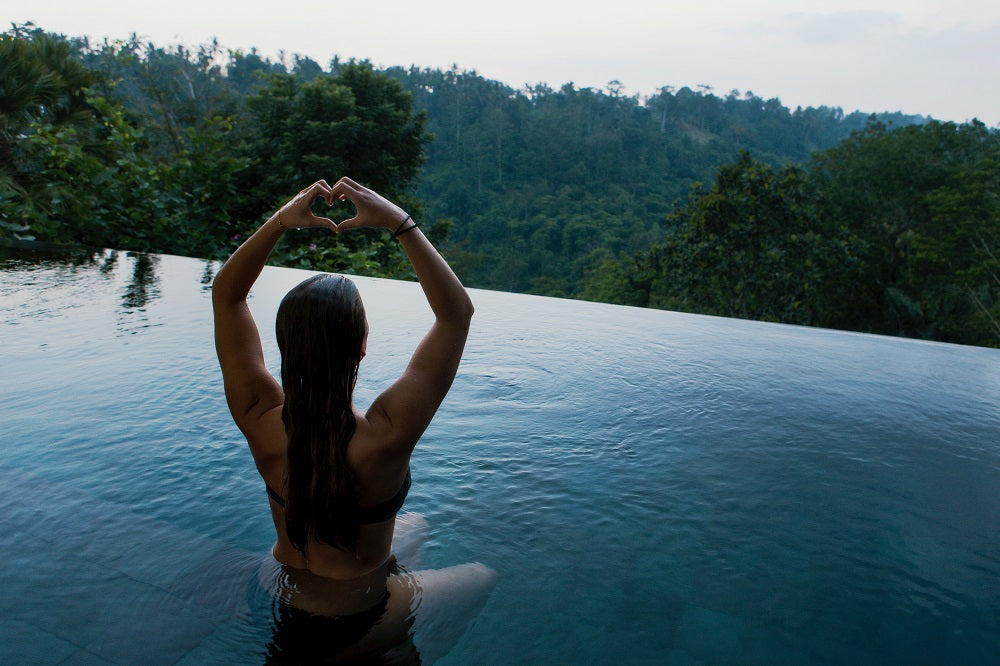 young woman swimming in water