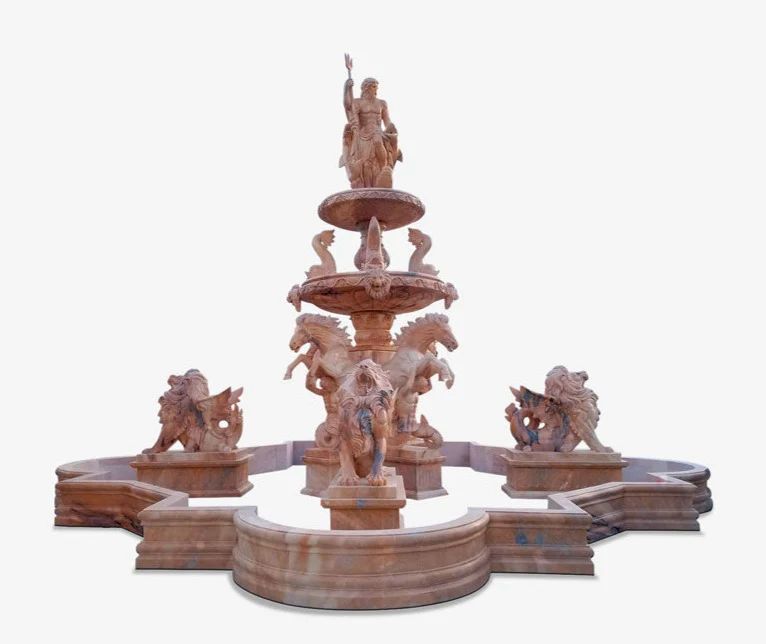 large stone fountain adorned with Greek mythical statues