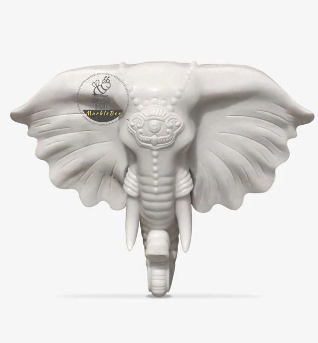 Large white marble elephant sculpture